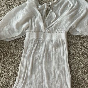 white swimsuit coverup